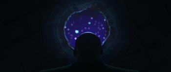 Movie still from “The Little Prince” (2015), directed by Mark Osborne – A man standing in front of a hole in the ground; Medium shot, Low angle