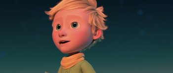 Movie still from “The Little Prince” (2015), directed by Mark Osborne – A cartoon boy with blonde hair looking up at the sky; Close Up shot, Low angle