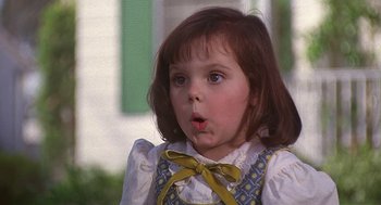 Movie still from “The Little Rascals” (1994), directed by Penelope Spheeris – A little girl with a surprised look on her face; Close Up shot, Low angle