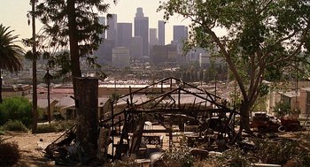 Movie still from “The Little Rascals” (1994), directed by Penelope Spheeris – A view of a city from the ground up; Extreme Wide shot, High angle