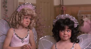 Movie still from “The Little Rascals” (1994), directed by Penelope Spheeris – Two little girls dressed up like fairies; Close Up shot, Over the shoulder angle