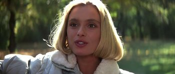 Movie still from “The Living Daylights” (1987), directed by John Glen – A person wearing a jacket; Close Up shot, Over the shoulder angle