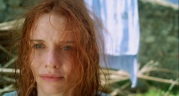 Movie still from “The Loneliest Planet” (2011), directed by Julia Loktev – A woman with red hair; Close Up shot, Low angle