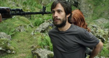 Movie still from “The Loneliest Planet” (2011), directed by Julia Loktev – A man and a woman are walking through the woods; Close Up shot, Over the shoulder angle