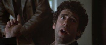Movie still from “The Long Goodbye” (1973), directed by Robert Altman – A person with a mouth open; Close Up shot, Low angle