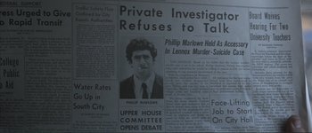 Movie still from “The Long Goodbye” (1973), directed by Robert Altman – A black and white photo of a newspaper article; Extreme Close Up shot, High angle