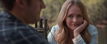 Movie still from “The Longest Ride” (2015), directed by George Tillman Jr. – A woman sitting next to a man in a park; Close Up shot, Over the shoulder angle