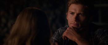 Movie still from “The Longest Ride” (2015), directed by George Tillman Jr. – A man and a woman sitting at a table in front of each other; Close Up shot, Over the shoulder angle