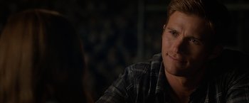 Movie still from “The Longest Ride” (2015), directed by George Tillman Jr. – A person wearing a plaid shirt; Close Up shot, Over the shoulder angle