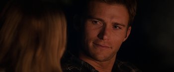 Movie still from “The Longest Ride” (2015), directed by George Tillman Jr. – A man's face in a dark room; Close Up shot, Over the shoulder angle