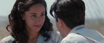 Movie still from “The Longest Ride” (2015), directed by George Tillman Jr. – A man and a woman looking at one another; Close Up shot, Over the shoulder angle