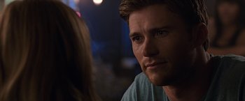 Movie still from “The Longest Ride” (2015), directed by George Tillman Jr. – A person sitting in front of another person; Close Up shot, Over the shoulder angle