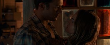 Movie still from “The Longest Ride” (2015), directed by George Tillman Jr. – A man and a woman looking at one another; Close Up shot, Low angle