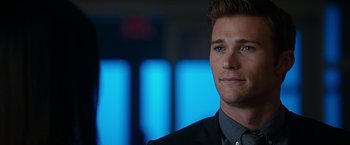 Movie still from “The Longest Ride” (2015), directed by George Tillman Jr. – A person wearing a suit and tie; Close Up shot, Over the shoulder angle