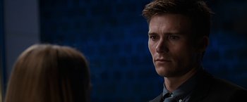 Movie still from “The Longest Ride” (2015), directed by George Tillman Jr. – A person wearing a suit and tie; Close Up shot, Over the shoulder angle