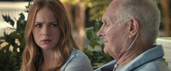Movie still from “The Longest Ride” (2015), directed by George Tillman Jr. – An older man and a young woman sitting next to each other; Close Up shot, Over the shoulder angle