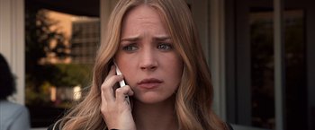 Movie still from “The Longest Ride” (2015), directed by George Tillman Jr. – A person talking on a cell phone; Close Up shot, Over the shoulder angle