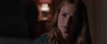 Movie still from “The Longest Ride” (2015), directed by George Tillman Jr. – A person with long blonde hair; Close Up shot, Over the shoulder angle