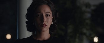 Movie still from “The Longest Ride” (2015), directed by George Tillman Jr. – A person wearing a black shirt; Close Up shot, Over the shoulder angle