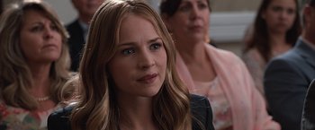 Movie still from “The Longest Ride” (2015), directed by George Tillman Jr. – A beautiful young woman with long blonde hair and green eyes; Close Up shot, Over the shoulder angle