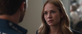 Movie still from “The Longest Ride” (2015), directed by George Tillman Jr. – A woman is looking at a man in a room; Close Up shot, Over the shoulder angle