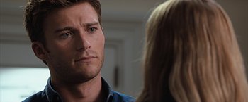 Movie still from “The Longest Ride” (2015), directed by George Tillman Jr. – A person looking at another person; Close Up shot, Over the shoulder angle