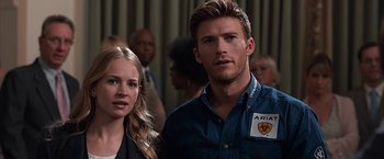 Movie still from “The Longest Ride” (2015), directed by George Tillman Jr. – A man and a woman standing next to each other; Close Up shot, Over the shoulder angle