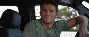 Movie still from “The Longest Ride” (2015), directed by George Tillman Jr. – A person sitting in a car; Close Up shot, Over the shoulder angle