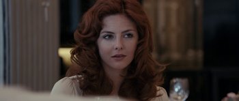 Movie still from “The Look of Love” (2013), directed by Michael Winterbottom – A person with red hair; Close Up shot, Over the shoulder angle