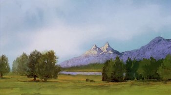 Movie still from “The Lord of the Rings” (1978), directed by Ralph Bakshi – A painting of a mountain with a lake in the background; Extreme Wide shot, Low angle