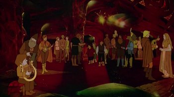 Movie still from “The Lord of the Rings” (1978), directed by Ralph Bakshi – A painting of people standing around in a cave; Wide shot, High angle