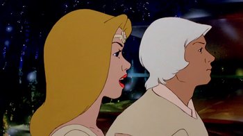 Movie still from “The Lord of the Rings” (1978), directed by Ralph Bakshi – A woman with blonde hair looking at a man with white hair; Close Up shot, Over the shoulder angle