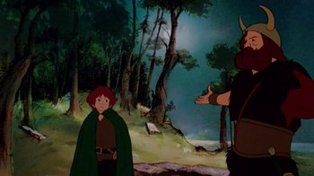 Movie still from “The Lord of the Rings” (1978), directed by Ralph Bakshi – A scene of a boy and a man in the woods; Medium shot, Low angle