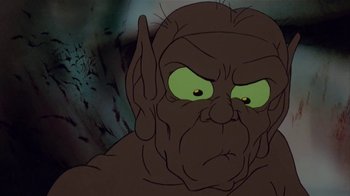 Movie still from “The Lord of the Rings” (1978), directed by Ralph Bakshi – An image of an animated character with green eyes; Close Up shot, Low angle