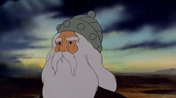 Movie still from “The Lord of the Rings” (1978), directed by Ralph Bakshi – An old man with a beard and a hat on; Close Up shot, Low angle