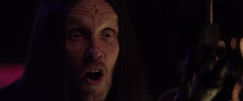 Movie still from “The Lords of Salem” (2012), directed by Rob Zombie – A person with long hair; Close Up shot, Low angle