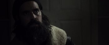 Movie still from “The Lords of Salem” (2012), directed by Rob Zombie – A man with a long beard wearing a jacket; Close Up shot, Low angle