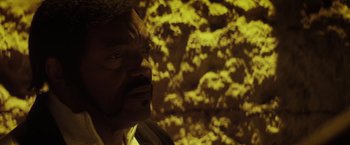 Movie still from “The Lords of Salem” (2012), directed by Rob Zombie – A man standing in front of a wall with lights on it; Close Up shot, High angle