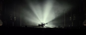 Movie still from “The Lords of Salem” (2012), directed by Rob Zombie – A group of people standing on top of a stage; Extreme Wide shot, High angle