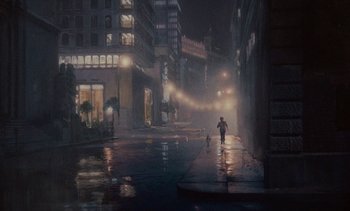 Movie still from “The Love Bug” (1969), directed by Robert Stevenson – A person walking down a street at night; Extreme Wide shot, High angle