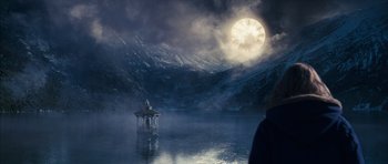 Movie still from “The Lovely Bones” (2009), directed by Peter Jackson – A gazebo in the middle of a body of water; Extreme Wide shot, Over the shoulder angle