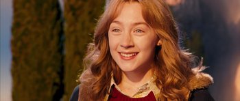 Movie still from “The Lovely Bones” (2009), directed by Peter Jackson – A person with long red hair; Close Up shot, High angle