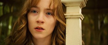 Movie still from “The Lovely Bones” (2009), directed by Peter Jackson – A person with blue eyes; Close Up shot, High angle