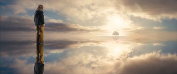 Movie still from “The Lovely Bones” (2009), directed by Peter Jackson – A lone tree in the middle of the ocean on a cloudy day; Extreme Wide shot, Low angle