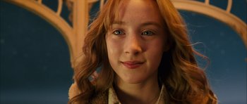 Movie still from “The Lovely Bones” (2009), directed by Peter Jackson – A young girl's face; Close Up shot, Low angle