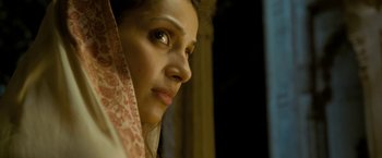 Movie still from “The Lovers” (2015), directed by Roland Joffé – A person wearing a scarf; Close Up shot, Low angle