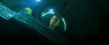 Movie still from “The Lovers” (2015), directed by Roland Joffé – A woman looking at her reflection in a mirror; Close Up shot, Low angle