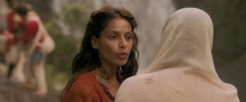 Movie still from “The Lovers” (2015), directed by Roland Joffé – A person wearing a red dress; Close Up shot, Over the shoulder angle