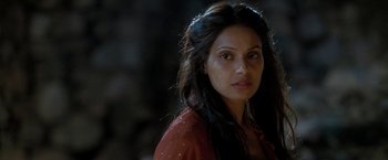 Movie still from “The Lovers” (2015), directed by Roland Joffé – A person with long dark hair; Close Up shot, Over the shoulder angle