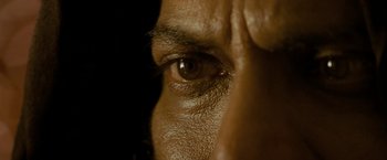 Movie still from “The Lovers” (2015), directed by Roland Joffé – A person's eye with a dark background; Extreme Close Up shot, Overhead angle